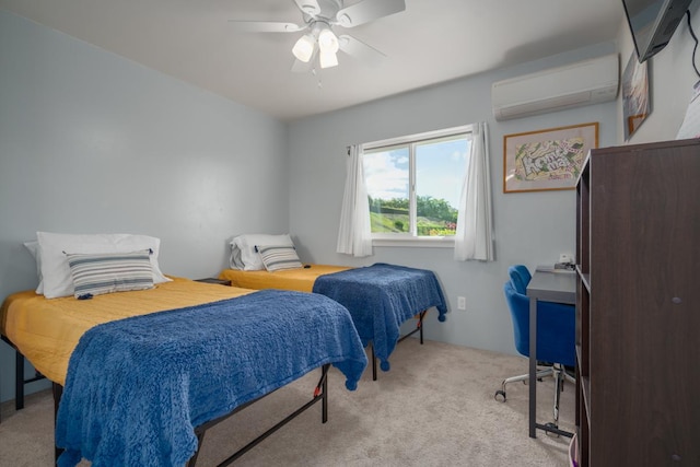 carpeted bedroom with a wall unit AC and a ceiling fan