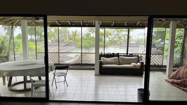 sunroom with a water view