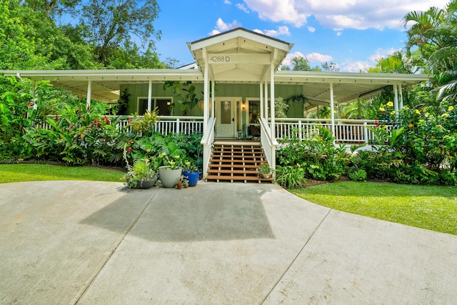 view of front facade with covered porch and stairs
