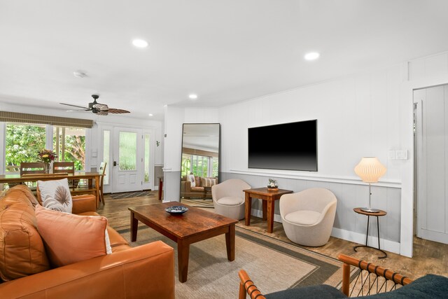 living room featuring wood finished floors, healthy amount of natural light, recessed lighting, and a ceiling fan
