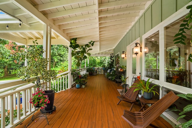 wooden deck featuring covered porch
