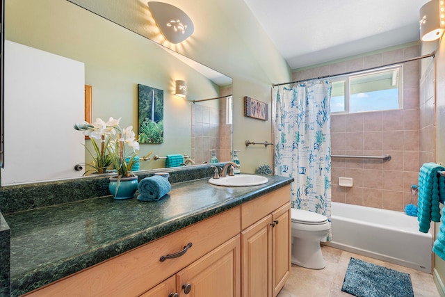 full bathroom with tile patterned floors, vanity, shower / tub combo with curtain, and toilet