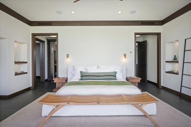 bedroom featuring baseboards and visible vents