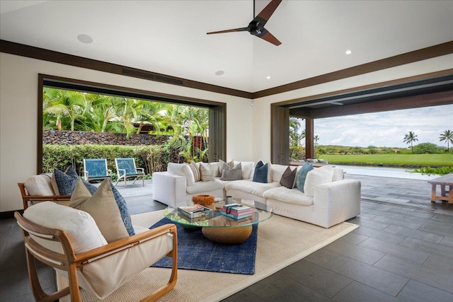 living area featuring ceiling fan, visible vents, and recessed lighting