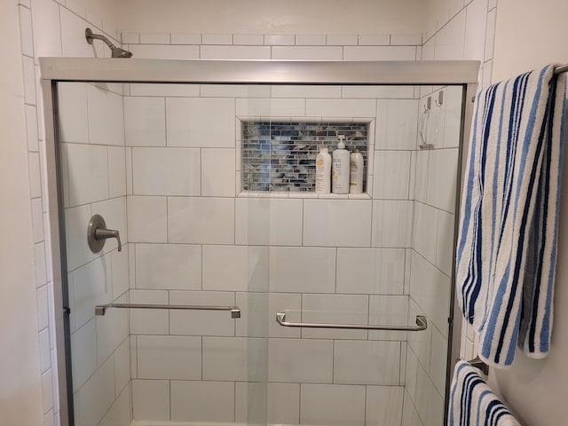 full bathroom with a stall shower