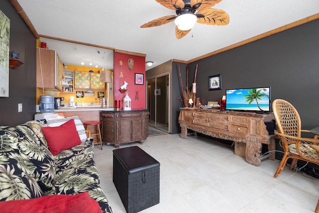 bedroom with a textured ceiling and a ceiling fan