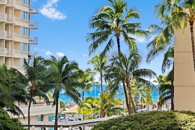 view of apartment building / complex featuring a water view