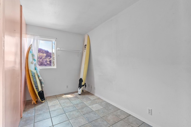 empty room featuring light tile patterned flooring