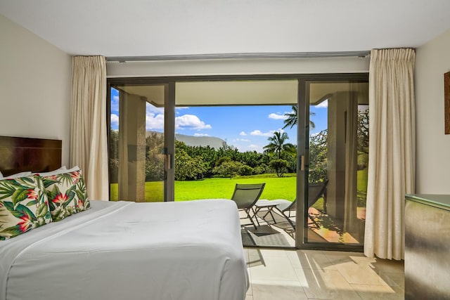 5380 Honoiki Rd Unit F16, Princeville, HI 96722 - tiled bedroom with access to exterior and multiple windows