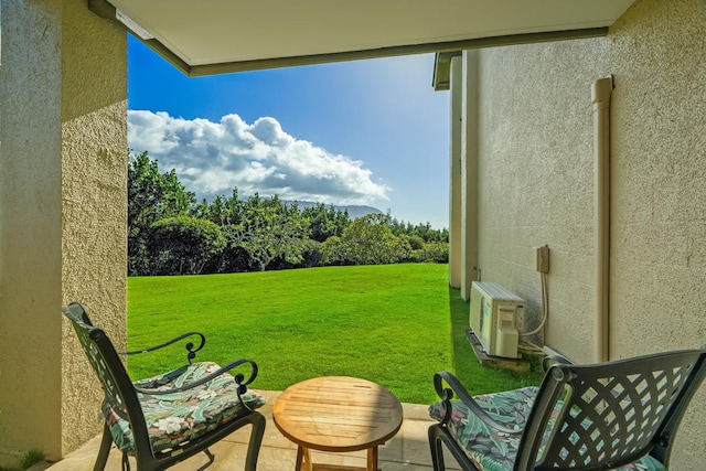 5380 Honoiki Rd Unit F16, Princeville, HI 96722 - view of grassy yard featuring ac unit and a patio area