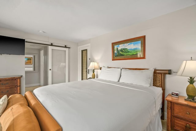 5380 Honoiki Rd Unit F16, Princeville, HI 96722 - bedroom with a barn door