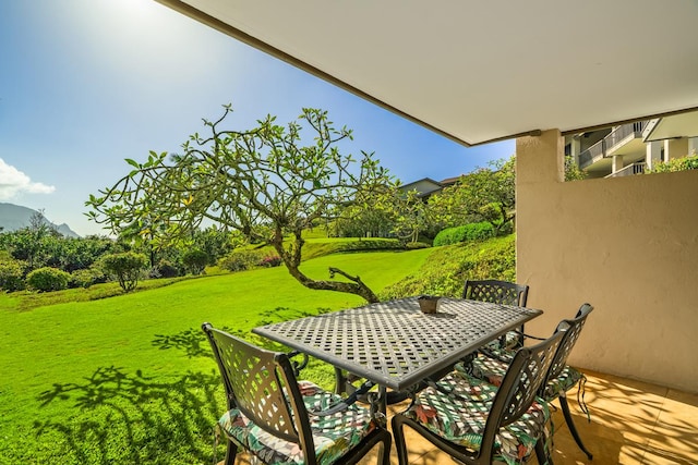 5380 Honoiki Rd Unit F16, Princeville, HI 96722 - balcony featuring outdoor dining space