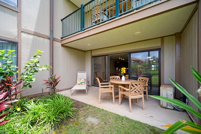 view of patio with a balcony