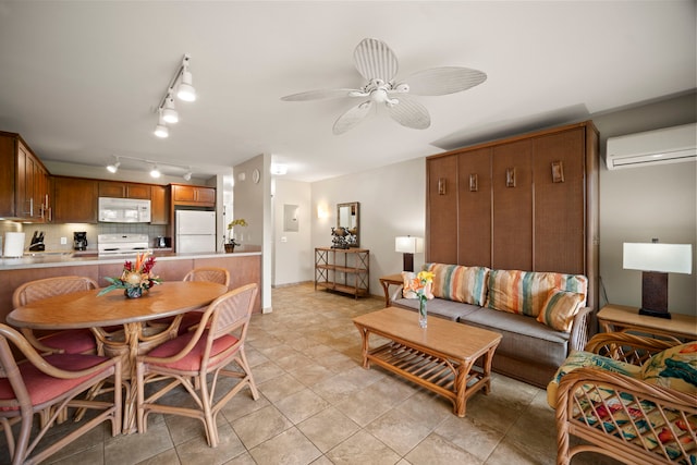 living room featuring a wall mounted air conditioner, a ceiling fan, and track lighting