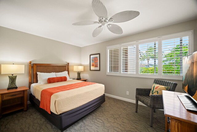 carpeted bedroom with baseboards and ceiling fan