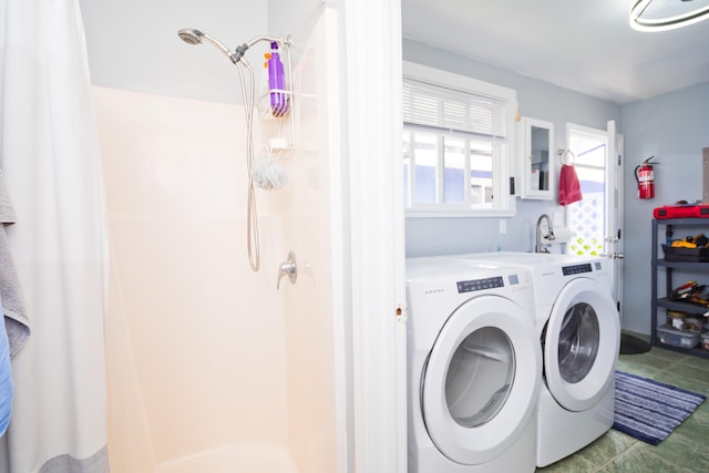 laundry room featuring independent washer and dryer