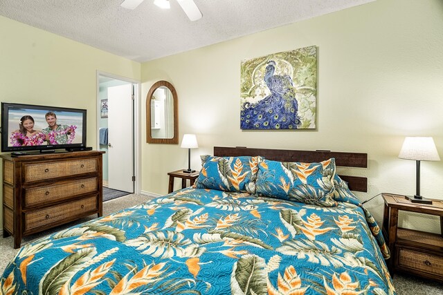 bedroom featuring carpet flooring, a textured ceiling, baseboards, and ceiling fan