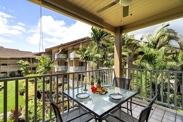 balcony with a ceiling fan and outdoor dining area