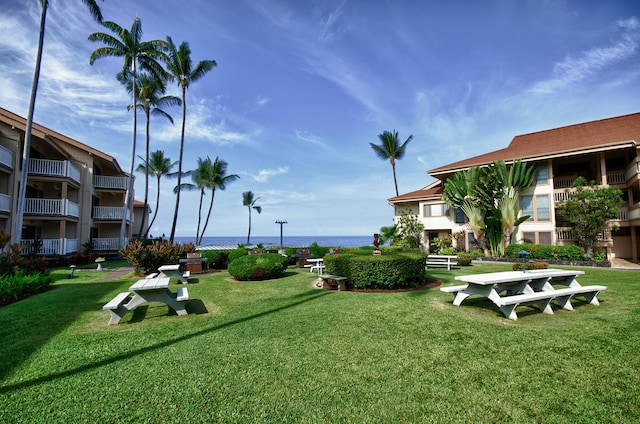 surrounding community with a lawn