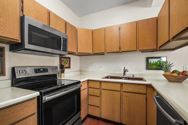 1901 Poipu Rd Unit 411, Koloa, HI 96756 - kitchen featuring appliances with stainless steel finishes, a sink, and light countertops