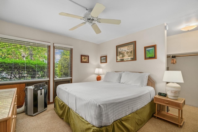 1901 Poipu Rd Unit 411, Koloa, HI 96756 - bedroom with light colored carpet and ceiling fan