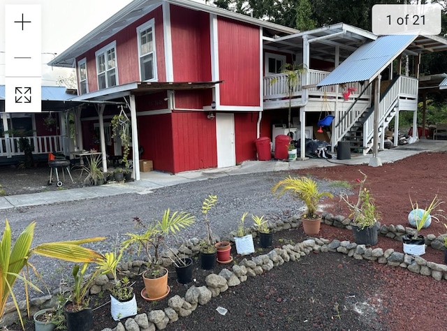 view of outbuilding with stairs
