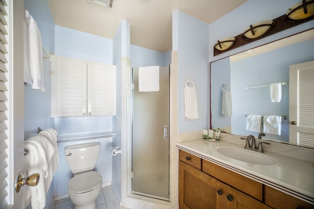 4460 Nehe Rd Unit 122, Lihue, HI 96766 - bathroom featuring a shower stall, toilet, vanity, and tile patterned floors