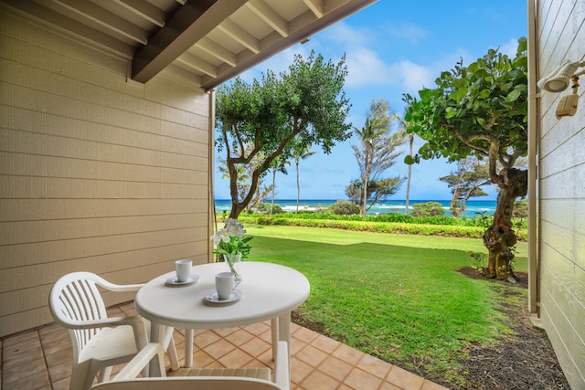 4460 Nehe Rd Unit 122, Lihue, HI 96766 - view of patio / terrace featuring a water view