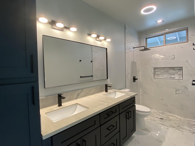 full bath featuring a marble finish shower, double vanity, toilet, and marble look tiles