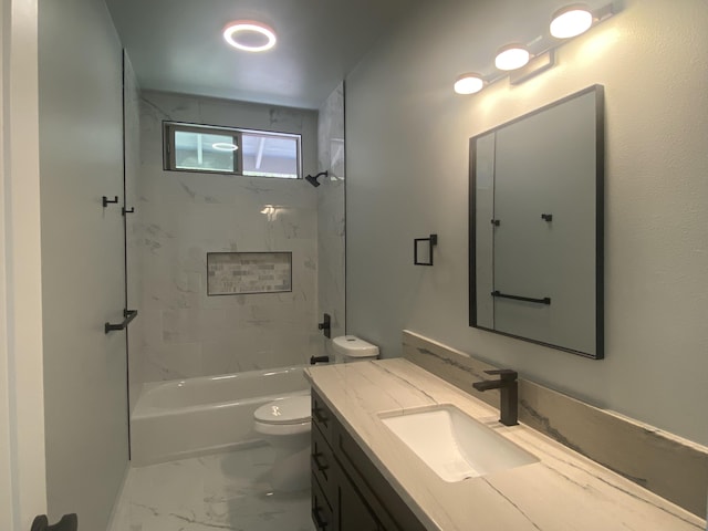 full bath featuring marble look tiles, toilet, vanity, and bathtub / shower combination