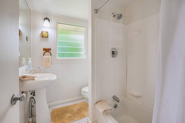 963 Niulani Rd, Kapaa, HI 96746 - bathroom with toilet, shower / tub combo with curtain, tile patterned floors, and baseboards
