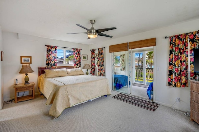 963 Niulani Rd, Kapaa, HI 96746 - carpeted bedroom with access to outside, baseboards, and ceiling fan