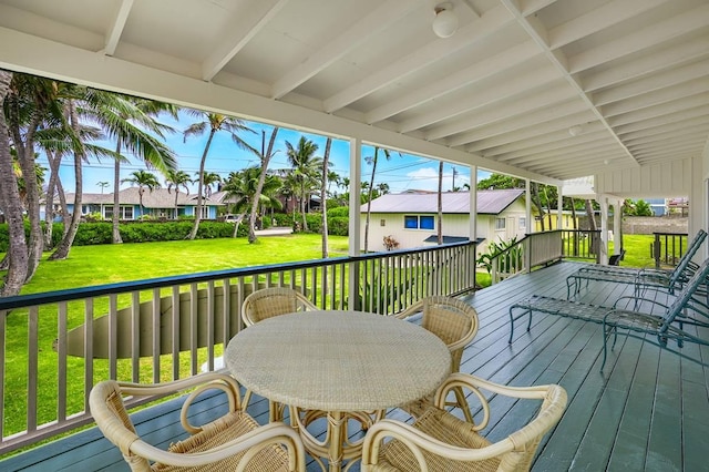 963 Niulani Rd, Kapaa, HI 96746 - wooden terrace with a residential view, a lawn, and outdoor dining area