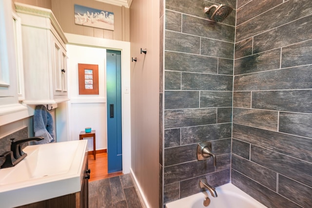 4-950 Kuhio Hwy, Kapaa, HI 96746 - bathroom featuring a sink, tub / shower combination, and wood finished floors