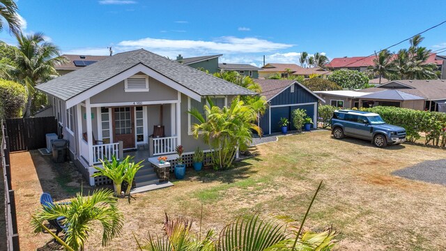 4-950 Kuhio Hwy, Kapaa, HI 96746 - view of front of property with a porch, roof with shingles, and stucco siding