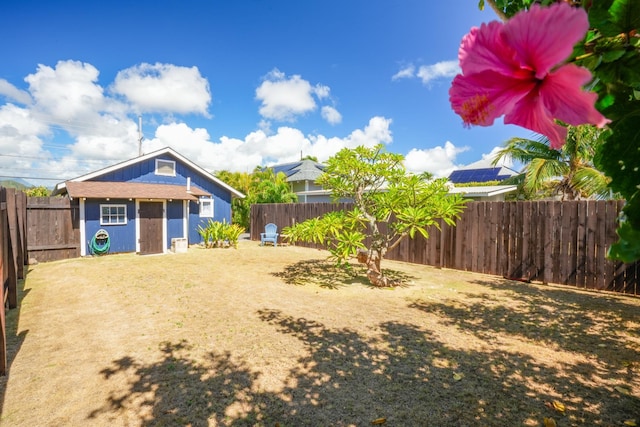 4-950 Kuhio Hwy, Kapaa, HI 96746 - fenced backyard featuring an outbuilding