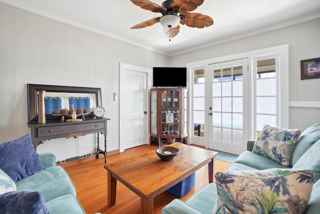 4-950 Kuhio Hwy, Kapaa, HI 96746 - living area with wood finished floors, ornamental molding, ceiling fan, and french doors