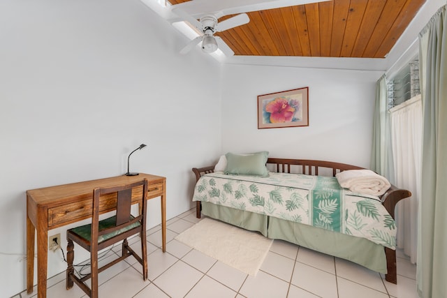 bedroom featuring wood ceiling, light tile patterned flooring, ceiling fan, and lofted ceiling