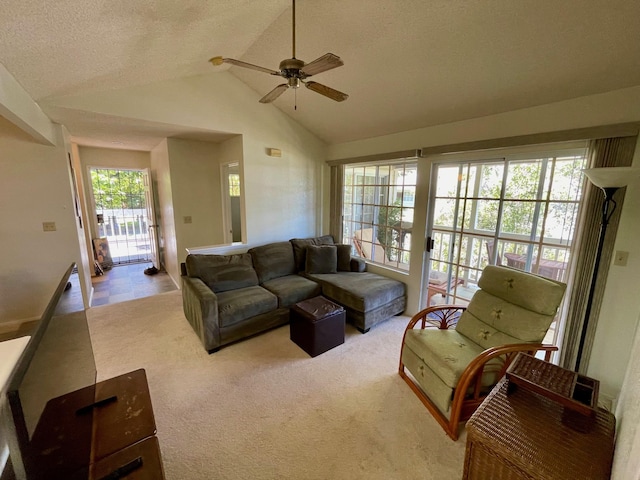 68-3883 Lua Kula St Unit 2005, Waikoloa, HI 96738 - carpeted living room featuring ceiling fan, vaulted ceiling, and a textured ceiling