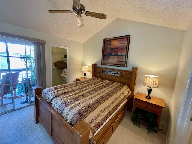 68-3883 Lua Kula St Unit 2005, Waikoloa, HI 96738 - bedroom with vaulted ceiling, a textured ceiling, light colored carpet, access to exterior, and a spacious closet