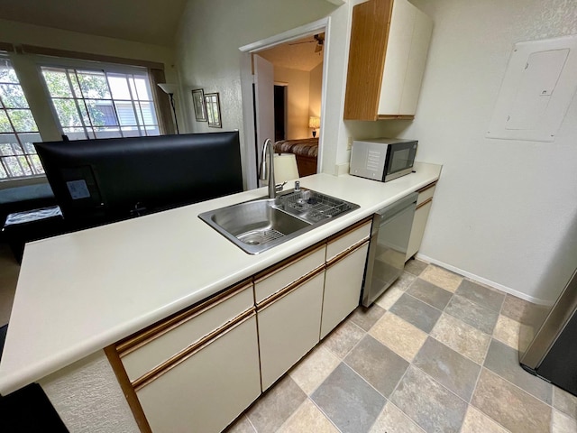 68-3883 Lua Kula St Unit 2005, Waikoloa, HI 96738 - kitchen featuring a sink, electric panel, light countertops, dishwasher, and stone tile floors