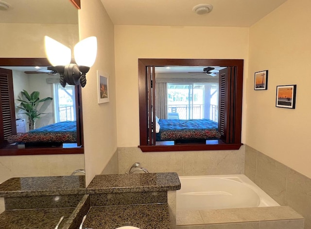 69-1033 Nawahine Pl Unit 10F, Waikoloa, HI 96738 - full bath featuring a garden tub, a ceiling fan, and vanity