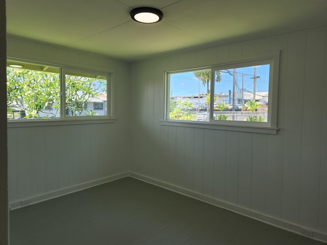 empty room with baseboards