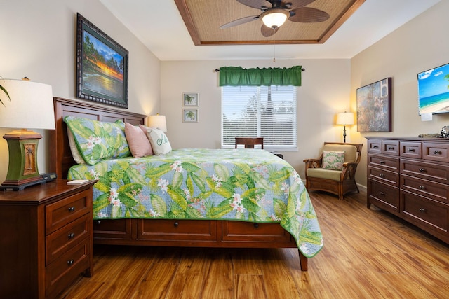 69-180 Waikoloa Beach Dr Unit O2, Waikoloa, HI 96738 - bedroom with wood finished floors and a raised ceiling