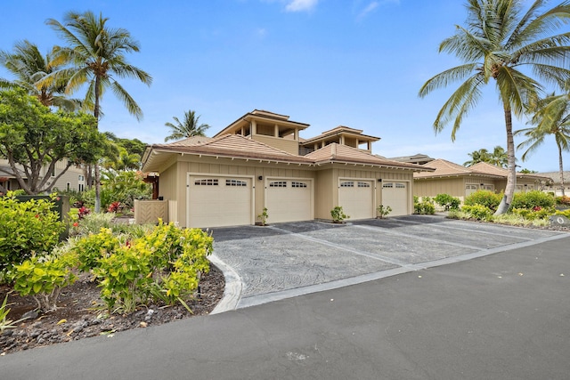 69-180 Waikoloa Beach Dr Unit O2, Waikoloa, HI 96738 - view of front of property with a tile roof and stucco siding