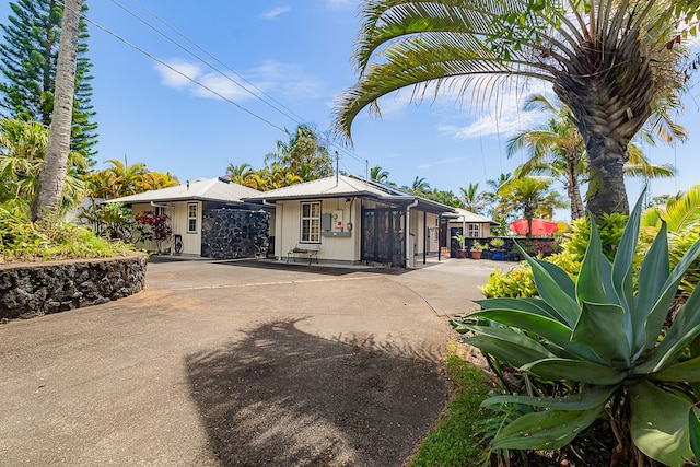 garage featuring driveway