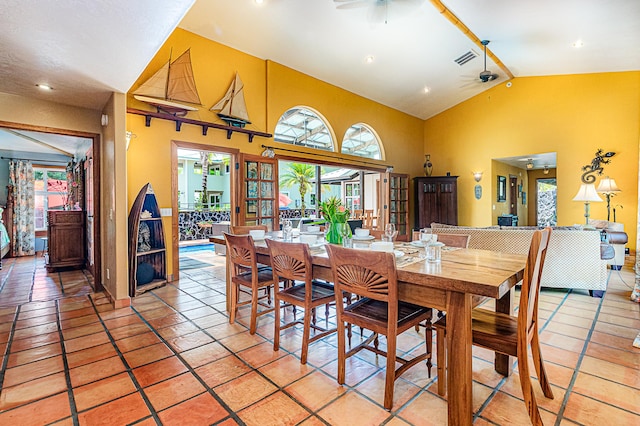 dining room featuring ceiling fan, plenty of natural light, high vaulted ceiling, and recessed lighting
