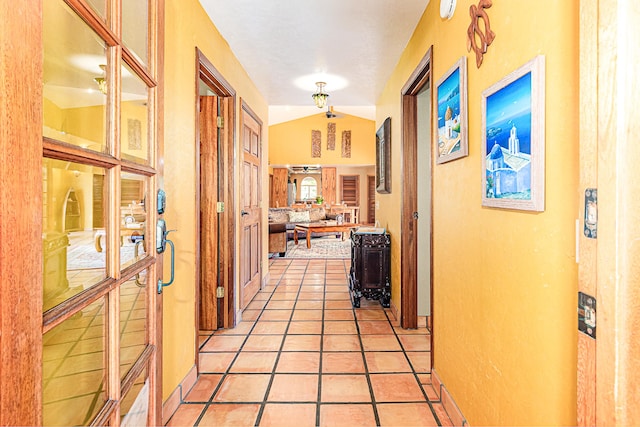 hallway with light tile patterned floors