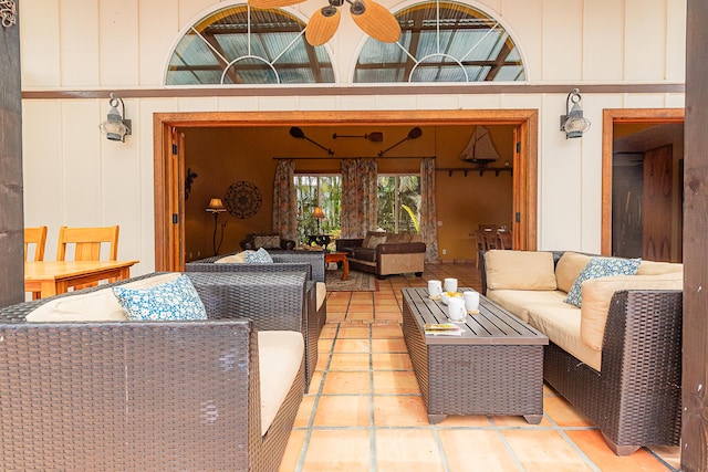 view of patio / terrace featuring an outdoor living space and ceiling fan