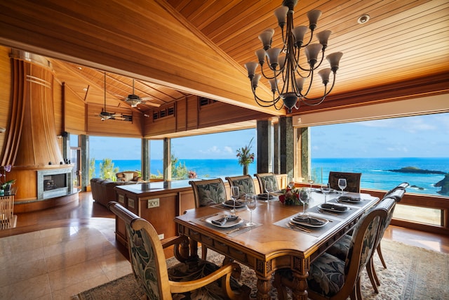 2620-A Kauapea Rd, Kilauea, HI 96754 - dining area with vaulted ceiling, wooden ceiling, a chandelier, healthy amount of natural light, and tile patterned floors